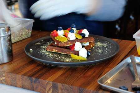 Chocolate waffle with fruitsの写真素材