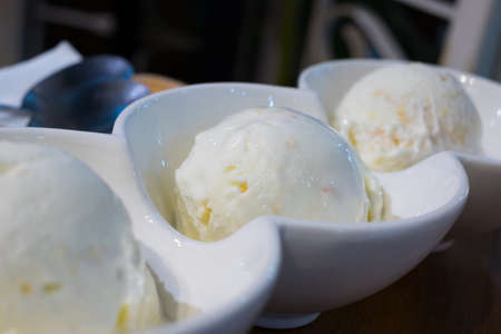ice-cream scoops in the bowlの写真素材