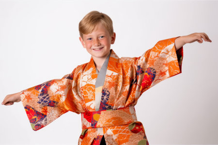 Portrait of a boy in kimono on a white backgroundの素材