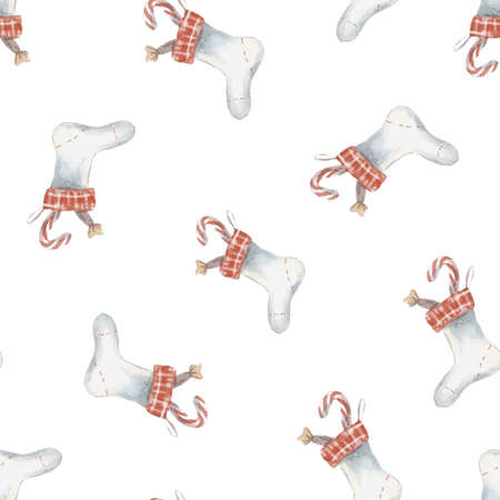 watercolor seamless pattern with a Christmas stockin, cobbler for the mantel on white backgroundの写真素材