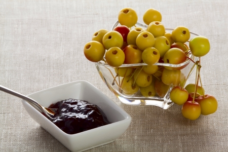 Wild apples in a vase and plam jamの写真素材