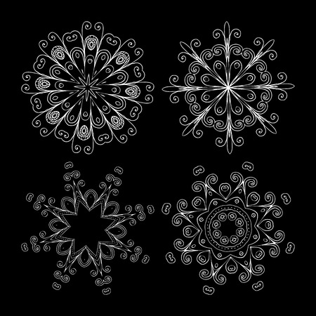 Vector beautiful ornamental rosettes set. For ethnic or tattoo design.のイラスト素材