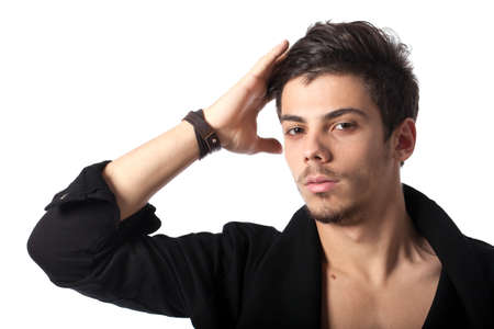 Portrait of a young man with cool hairstyle. Isolated on white background. Studio horizontal image.の写真素材