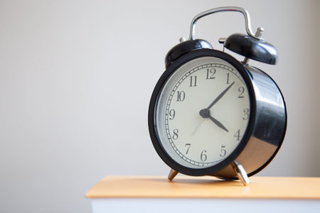 Alarm clock on the book
