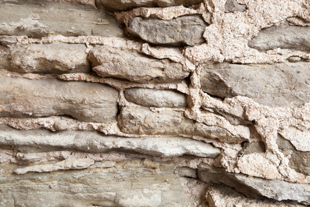 Background of the old natural stone wall.の写真素材