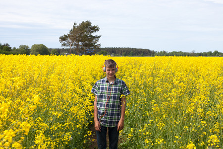 Teenager on the rape fieldの写真素材