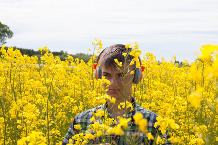 Teenager on the rape fieldの写真素材