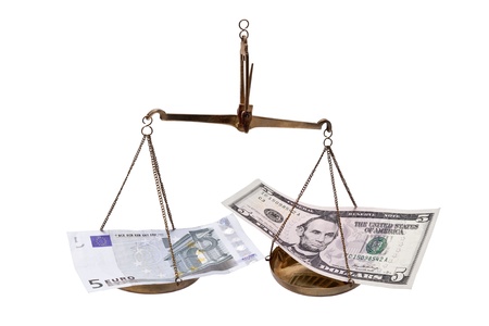 Banknotes Euro and Dollar in balance isolated on white background.の写真素材