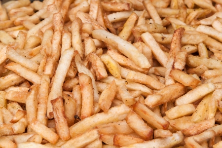 Pommes frites fried in oilの写真素材