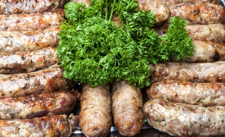 Grilled sausages with herbsの写真素材