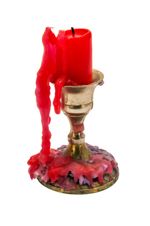 Candlestick with a candle candle-end Isolated on white backgroundの写真素材
