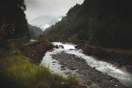 Panoramic view on mountain lake in front of mountain range,の写真素材