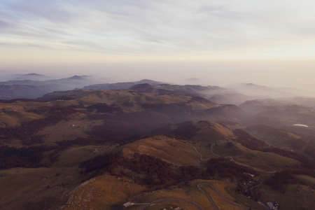 Panoramic view of green mountains. Yolyn Am or Eagle valley at sunset. Aerial view. mountainsの写真素材