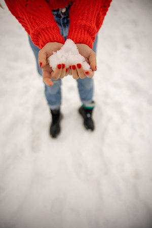 Snow in hand, white background in the cold mountains italyの写真素材