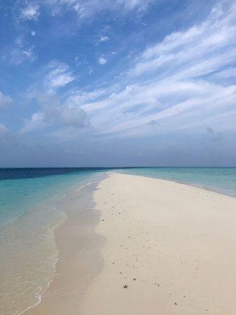 Ocean view, amazing nature background. Beautiful strip of white sand surrounded by crystal clear water. Maldivesの写真素材