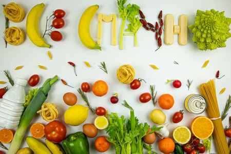 mix of fruit and vegetable food on a white backgroundの写真素材