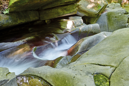 waterfall in the mountainsの写真素材