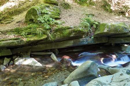 waterfall in the mountainsの写真素材