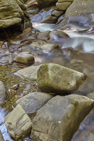 waterfall in the mountainsの写真素材