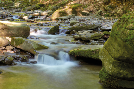 waterfall in the mountainsの写真素材