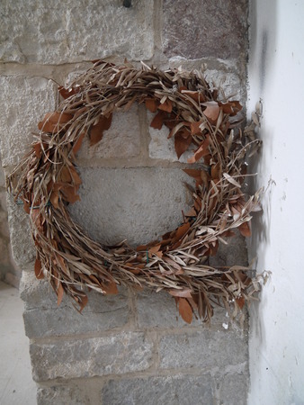 Wheat Wreath Hanging on a wall, Montenegro. Old Barの写真素材