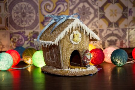 fairy Christmas house cake with candle light insideの写真素材