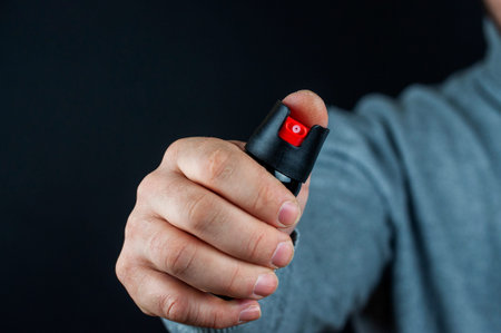 gas canister in the hand of a man, the concept of using protective equipmentの写真素材