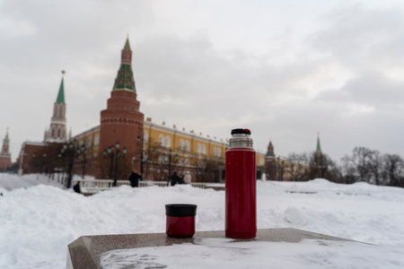 Russia, Moscow, February 14, 2021, thermos and a cup of tea near the Moscow Kremlin