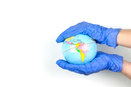 Concept protect the world from infection and spread of the virus. Isolation, medical mask and gloves. Personal protective equipment protection.Pandemic.の写真素材