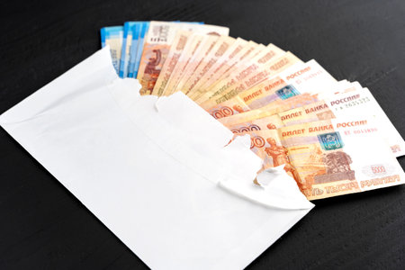 money in an envelope, the concept of a black salary