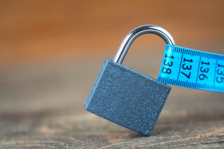 lock and measuring ruler, the secret of weight loss, the concept of proper nutrition