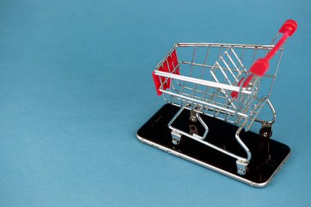 shopping cart on a smartphone, an online shopping concept