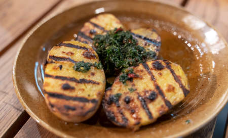 baked potatoes with spices a dish from theの写真素材