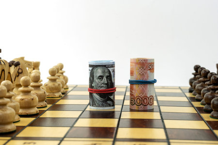 dollars and rubles on the chessboard, the concept ofの写真素材