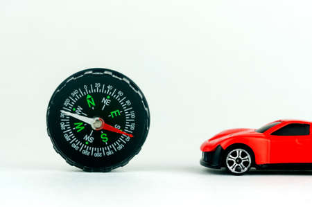 car model and compass, travel concept upの写真素材