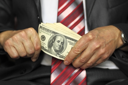 Businessman said one hundred dollar billの写真素材