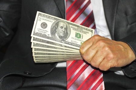 Businessman said one hundred dollar billの写真素材