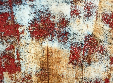 Picture of a rusty, colored metal surfaceの写真素材