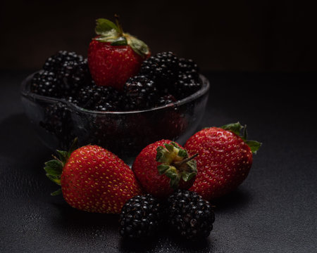 Close-up view of mixed, assorted berries blackberry, strawberry, background. Colorful and healthy concept.の写真素材