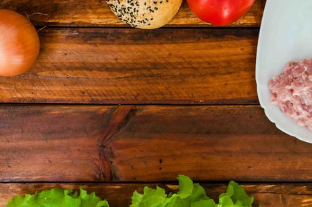 lettuce, onions, tomato and forcemeat do not table,fresh organic productsの写真素材