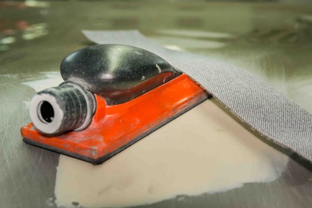 nut screwed on a bolt, an object made of steel,car repairの写真素材