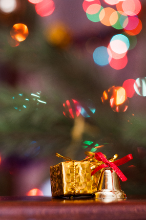 Christmas toys on the background of the Christmas tree and gerlandの写真素材