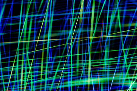 space rain, chaotic stripes of blue, green, yellow on a black background, abstraction, rainbow