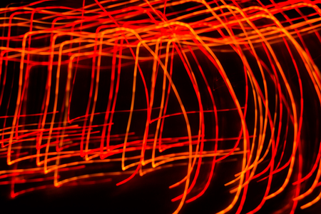 space rain, chaotic stripes of blue, green, yellow on a black background, abstraction, rainbowの写真素材