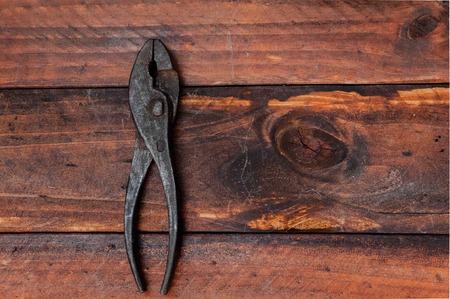 metal tools for plumbing repairs, metal saws, pliers, metal shears, retro toolsの写真素材