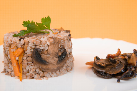 boiled brown buckwheat beans with mushrooms, carrots and onionsの写真素材