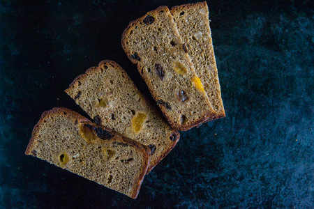 rye bread with prunes, dried apricots and sunflower seeds, dietary pastriesの写真素材