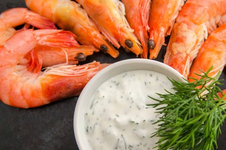 red boiled shrimps, garlic sauce for meat and fishの写真素材