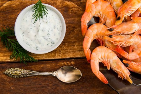red boiled shrimps, garlic sauce for meat and fishの写真素材