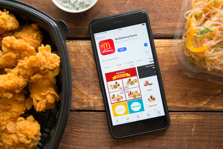 Stavropol, Russian Federation. June 10, 2019. Smartphone with mobile application McDelivery Koreaのeditorial素材